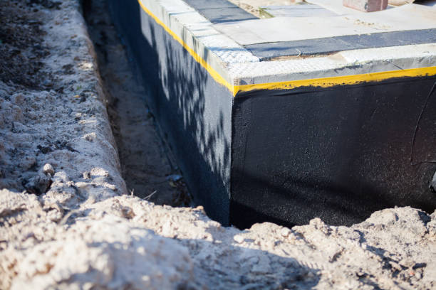 Professional Waterproofing technician working in Madison, IL